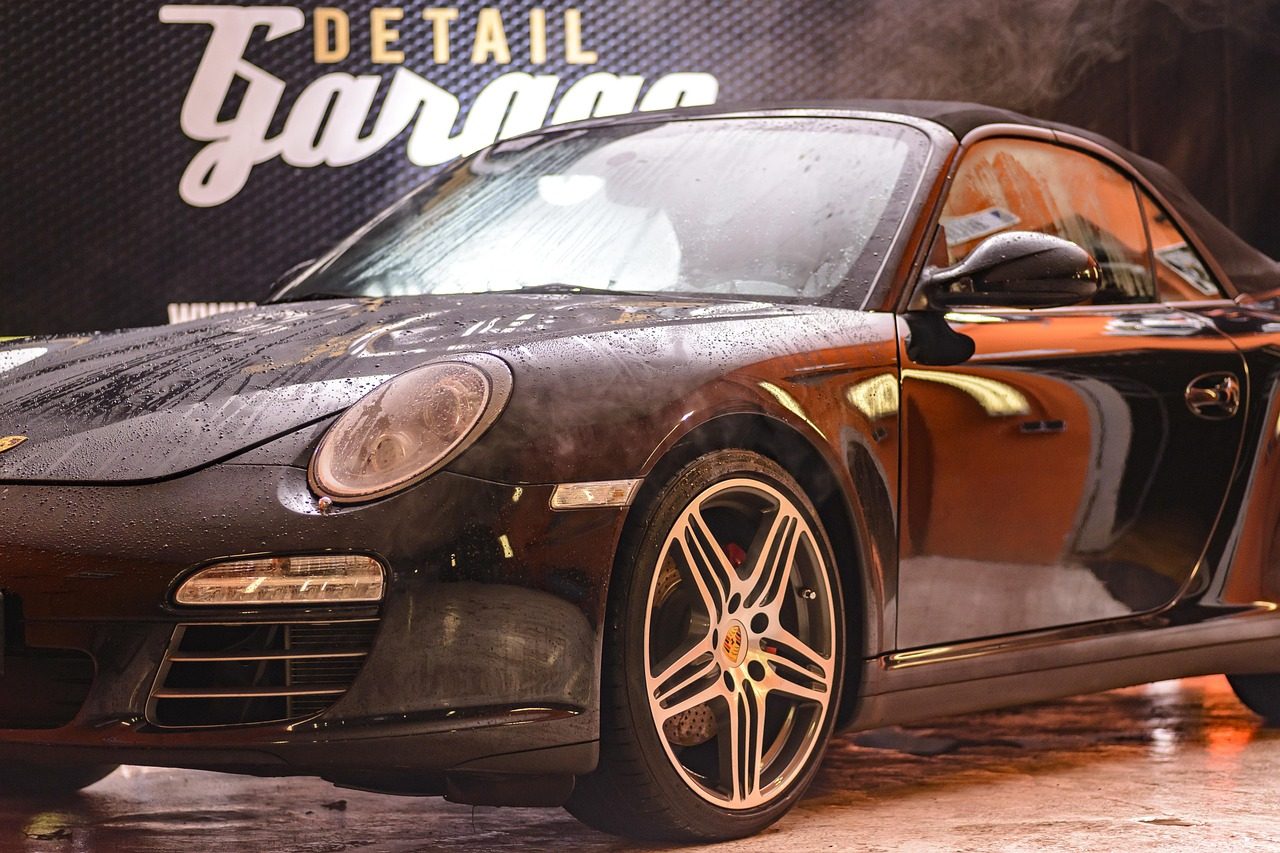 Sports car in atmospheric smoke and light