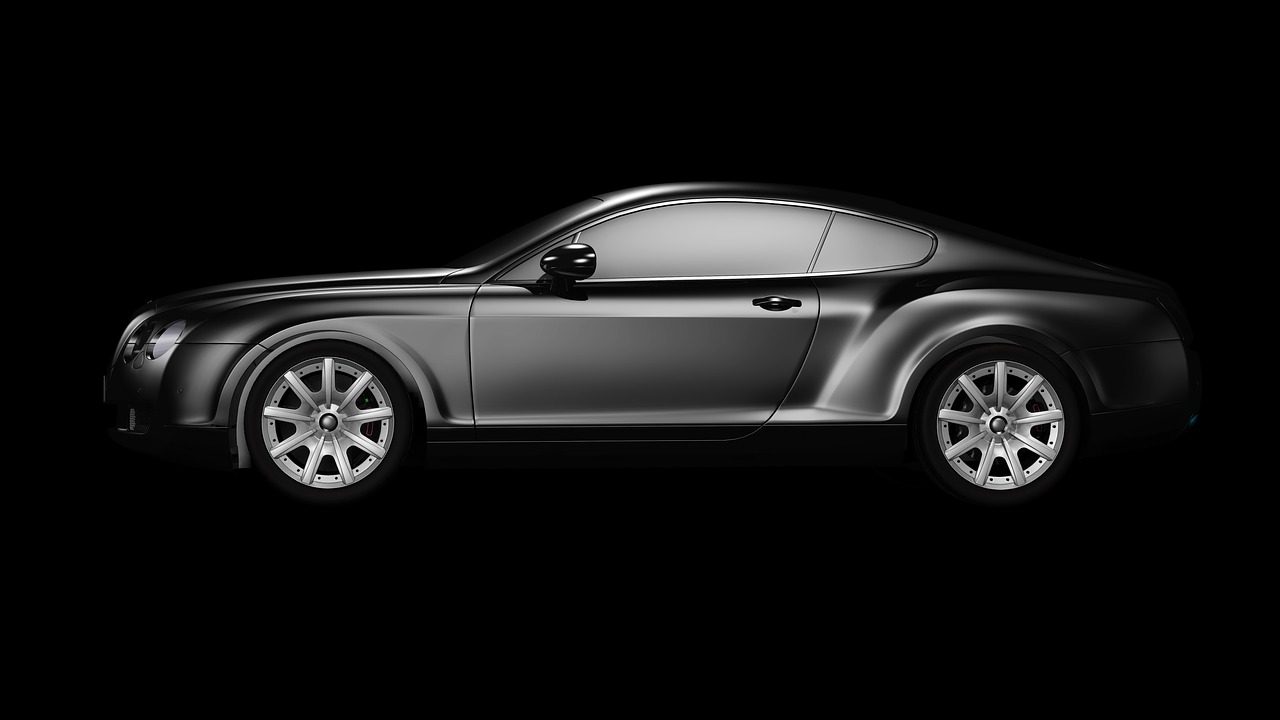 Silver sports car in studio light